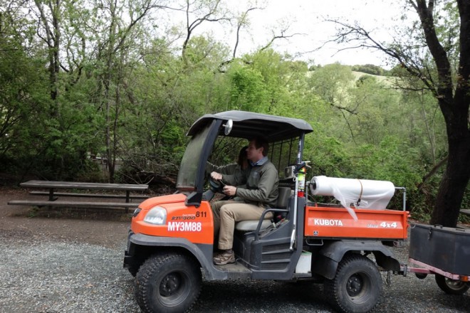 Rep. Swalwell drives the park tractor to survey the area