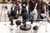Microphones at a news conference
